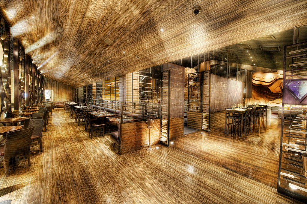 I think this restaurant is amazingly cool.  Wood always gives a nice warm feeling to a place, and this place could not have possibly have had more wood inside!  I'd love to meet the interior designers of these places... I bet they are real characters.  This place is the FiAMMA Trattoria and Bar inside the MGM Grand Hotel in Vegas.

I'll be back in Vegas in a few weeks and I'm looking forward to it.  I've got a lot of unpublished photos from there and there are about to be a bunch more!  It's a shooter's heaven there... and a nice distraction from the gaming tables!

From the blog at www.stuckincustoms.com
